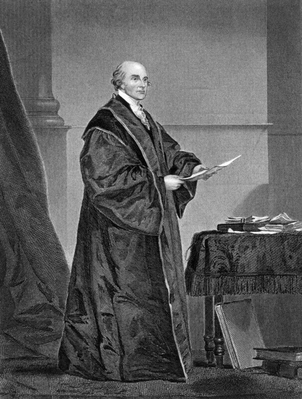 John Jay with a paper in the hand