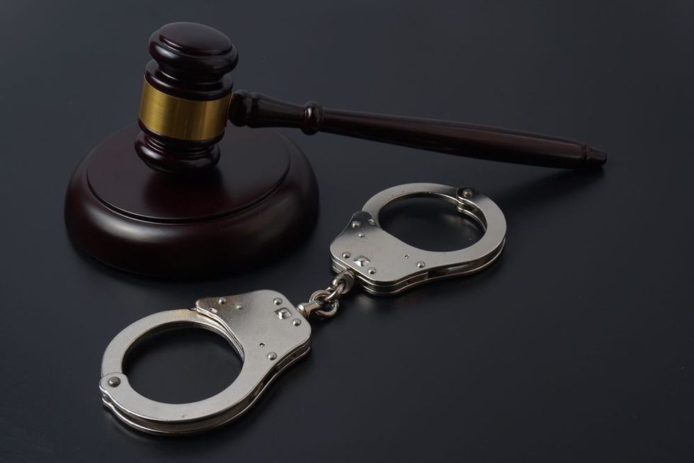 Judge gavel and handcuffs