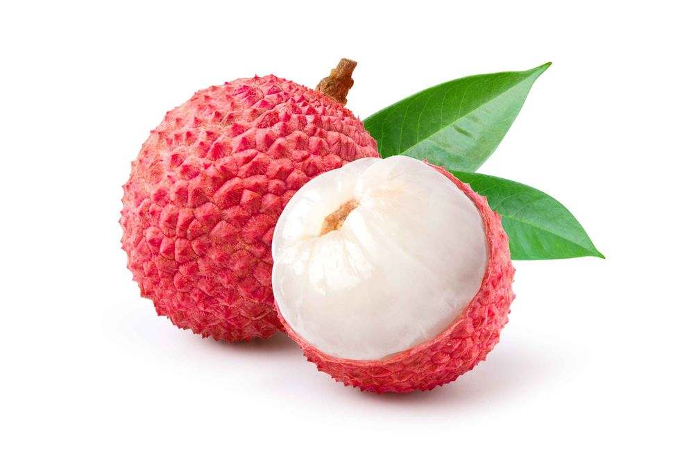 Juicy Lychee with cut in half and leaves