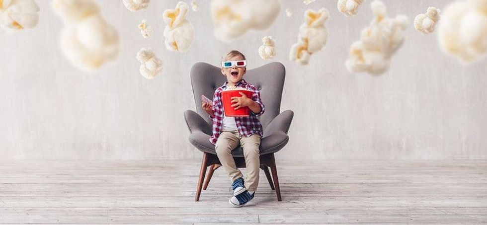Kid watching a 3d movie