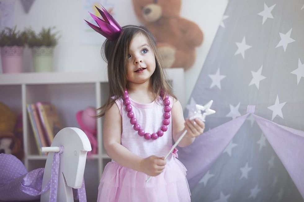 Kid with magic wand in hand