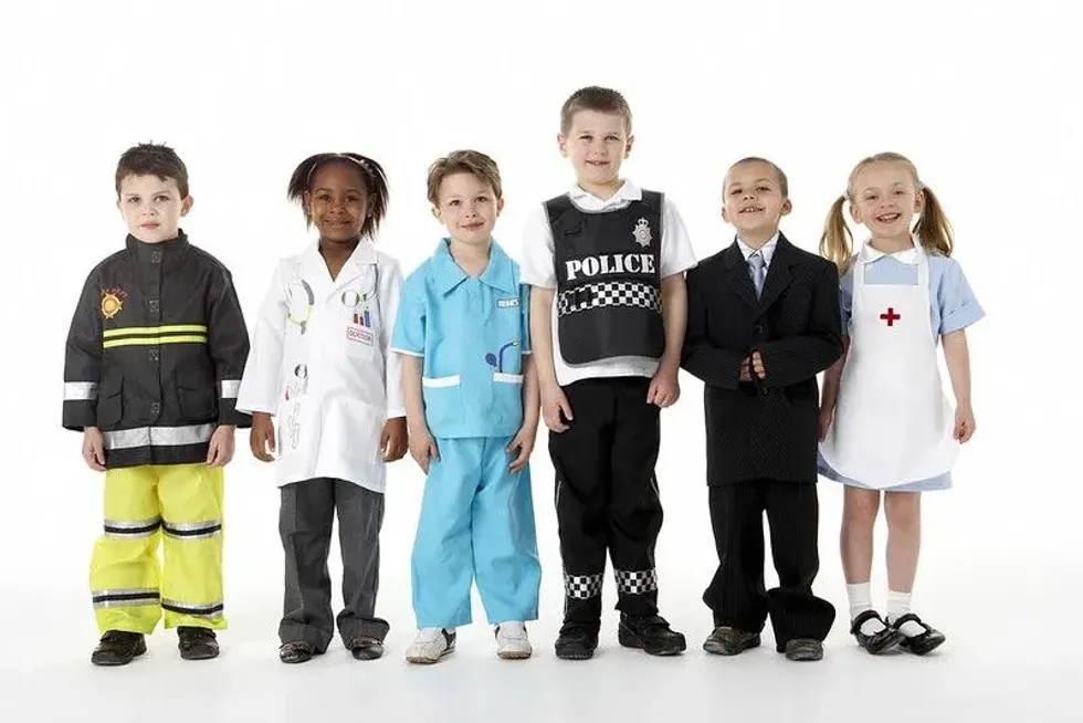 Kids dressing up in work costumes, in police outfit. 