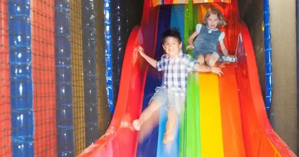 Kids on slide at softplay centre