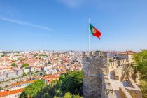 Landscape of Portuguese city and flag