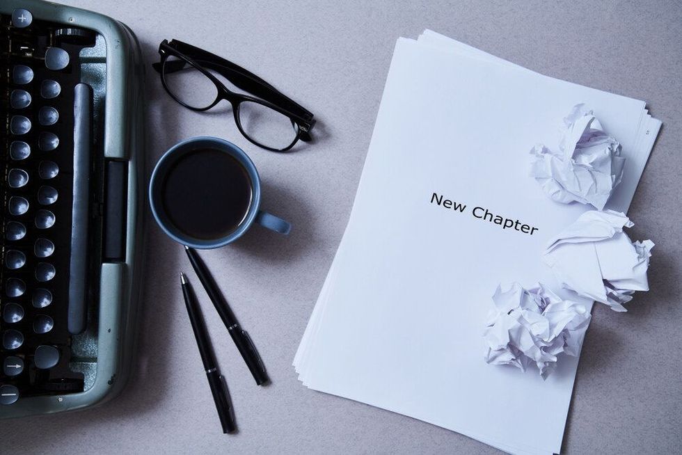 Literature, author and writer, writing and journalism concept: typewriter, cup of coffee and glasses and a paper