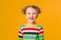 Little blonde girl smiling