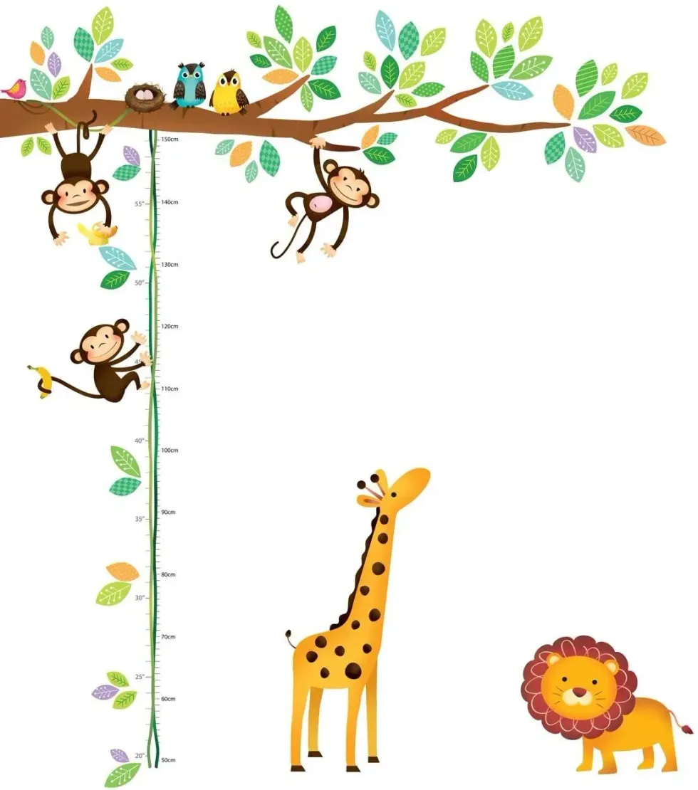 Little monkey hanging in the tree with other animals around.