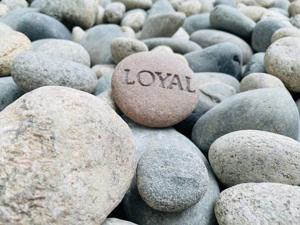 Loyal engraved on stone