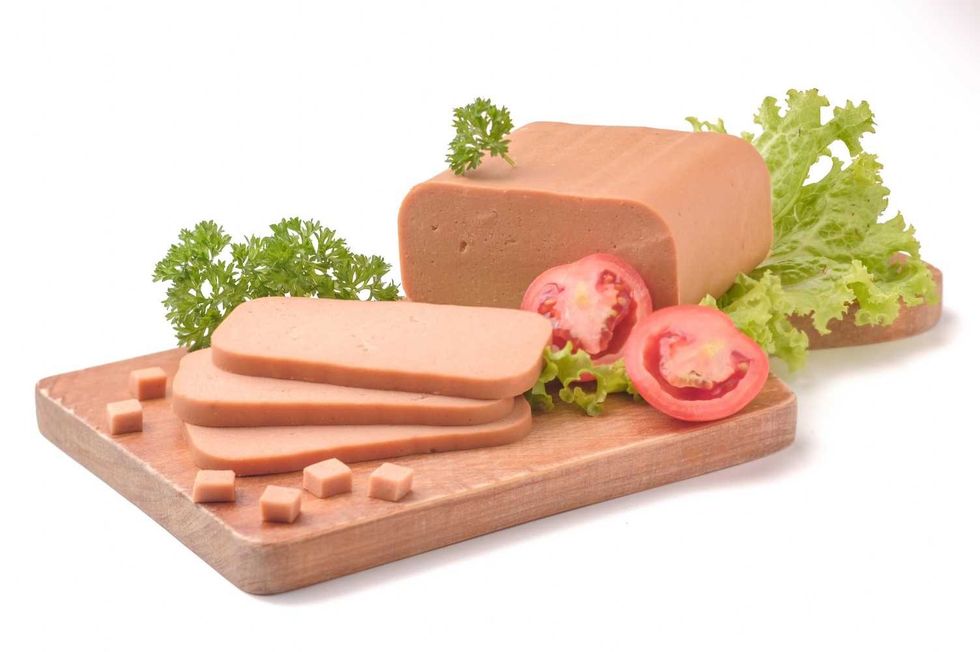 Luncheon and vegetables are foods that are usually served with sandwiches