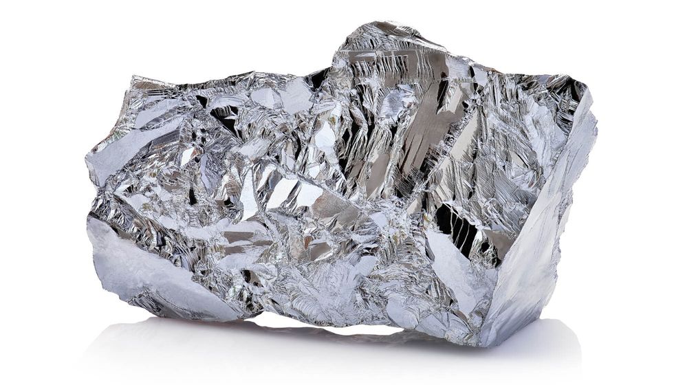 Macro shoot of piece of nickel metal ore isolated.