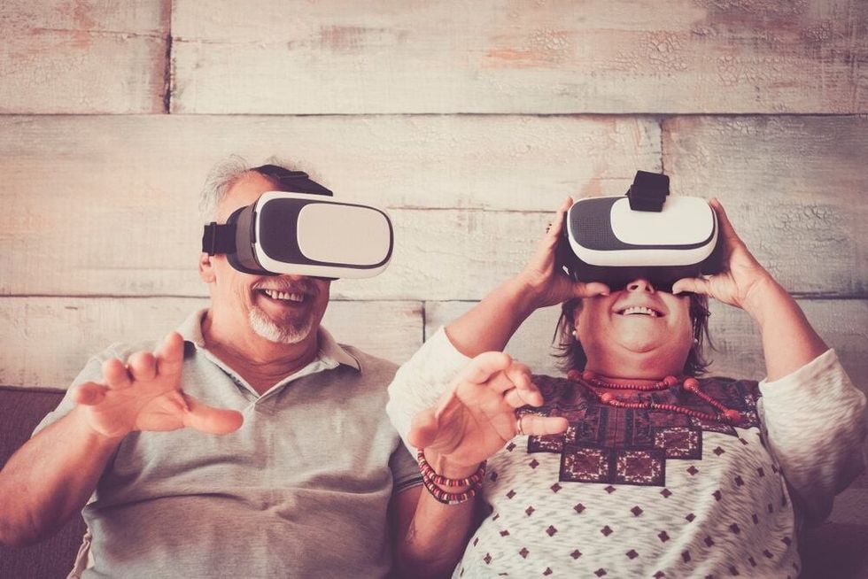 man and woman senior caucasian try new things trendy.