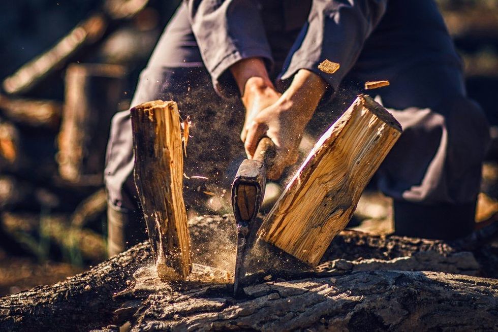 Man holding an industrial axe