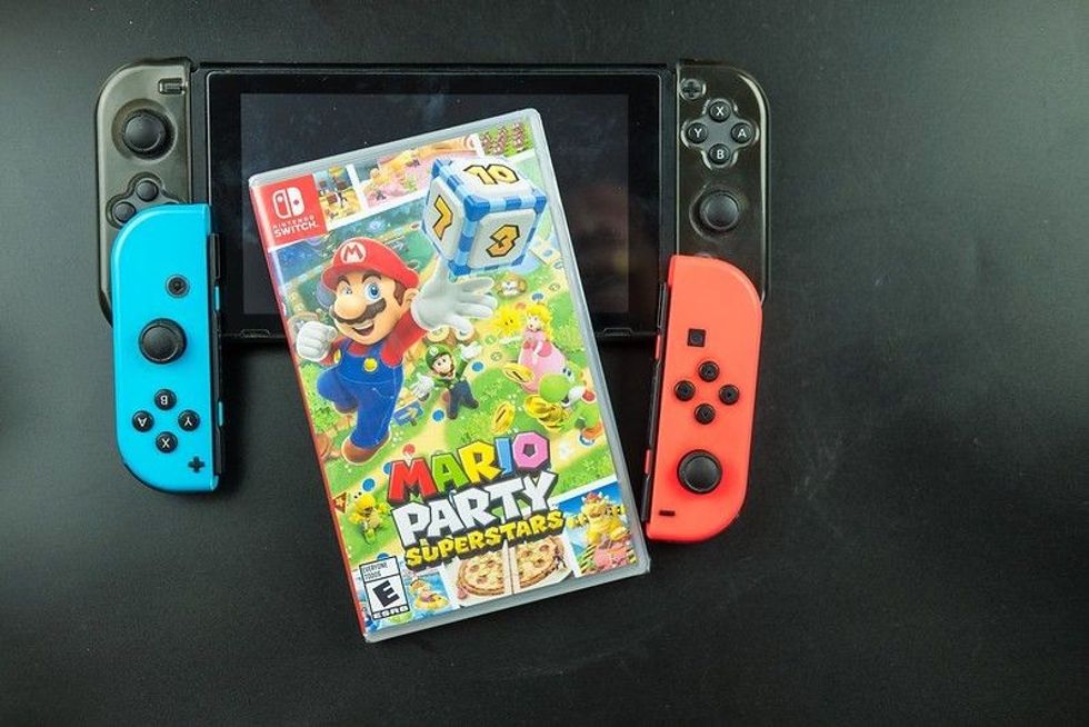Mario Party Superstars video game cartridge with box