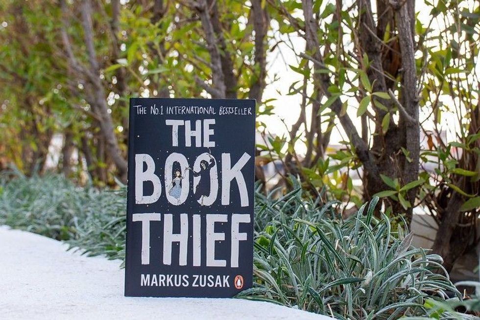Markus Zusak's The Book Thief book in the garden