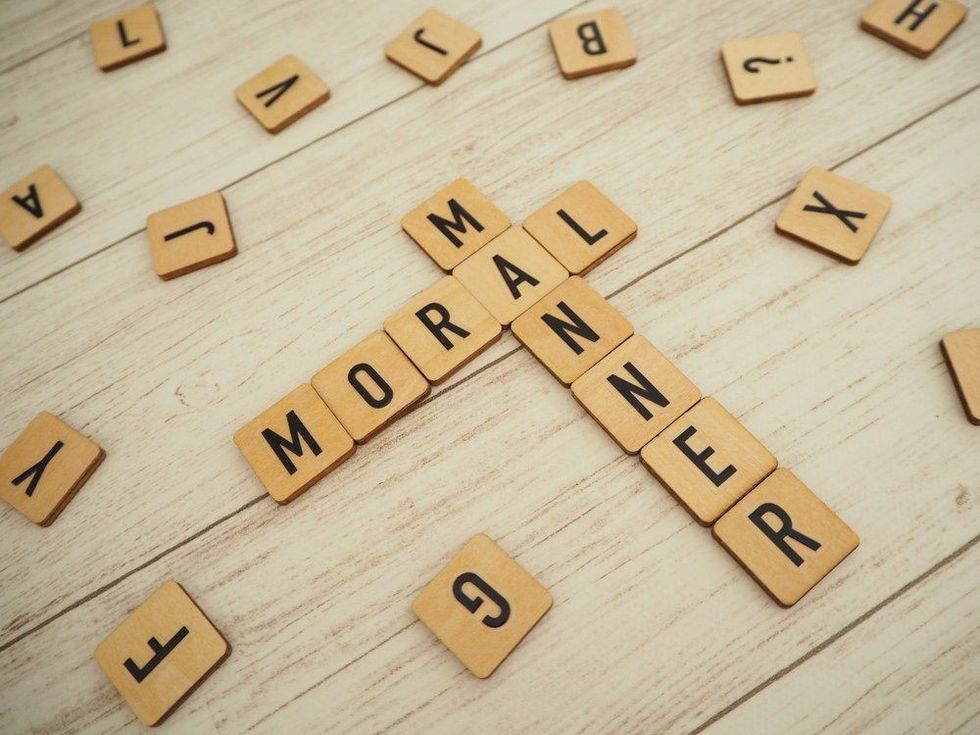 Moral and manner words in wooden blocks.