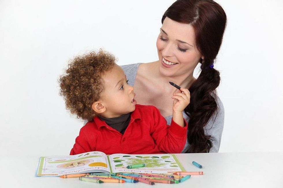 Mother and baby studying and having fun.