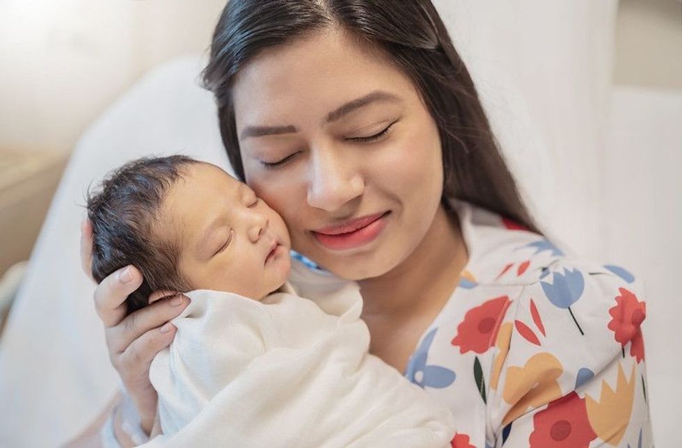 Mother holding a newborn baby