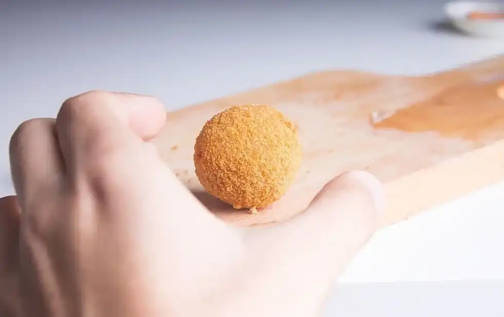 National Cheeseball Day is the time to enjoy your favorite puffed cheese balls.