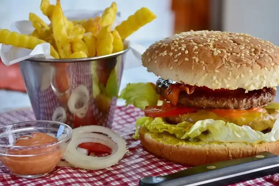 National Junk Food Day is the occasion for eating junk foods like burgers and candy.
