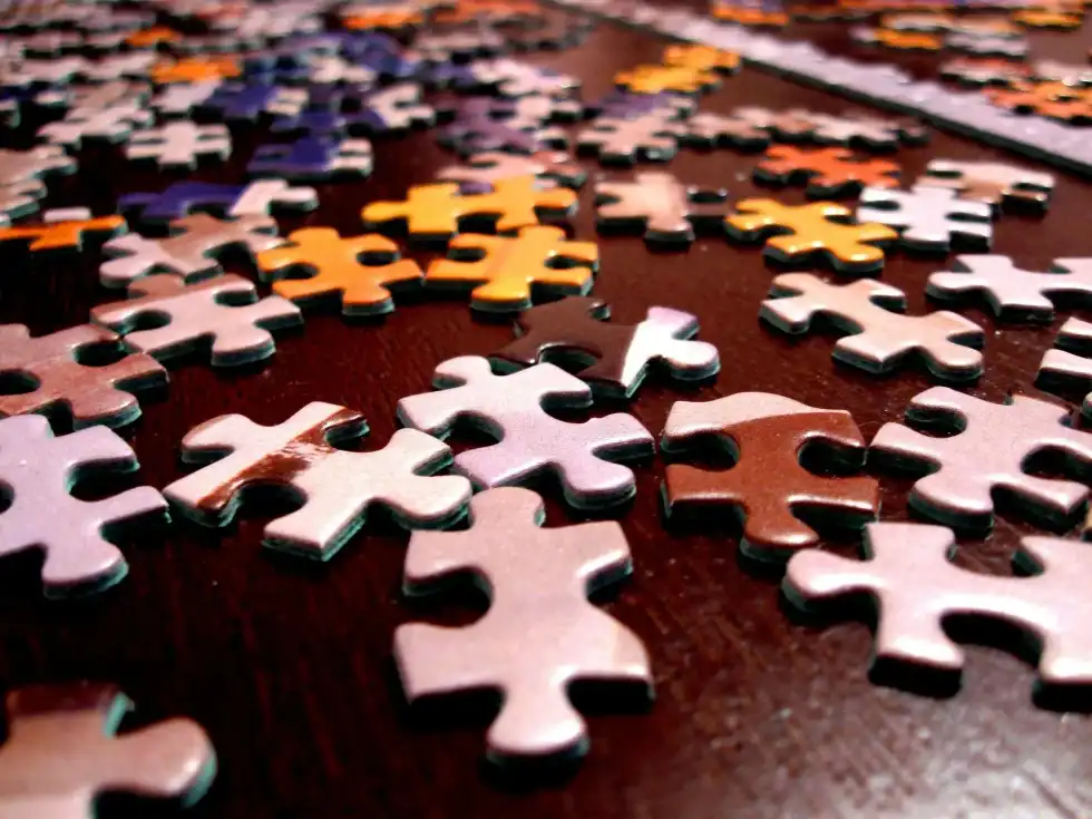 National Puzzle Day can be used to enhance a person's vocabulary and language skills if they play puzzles.