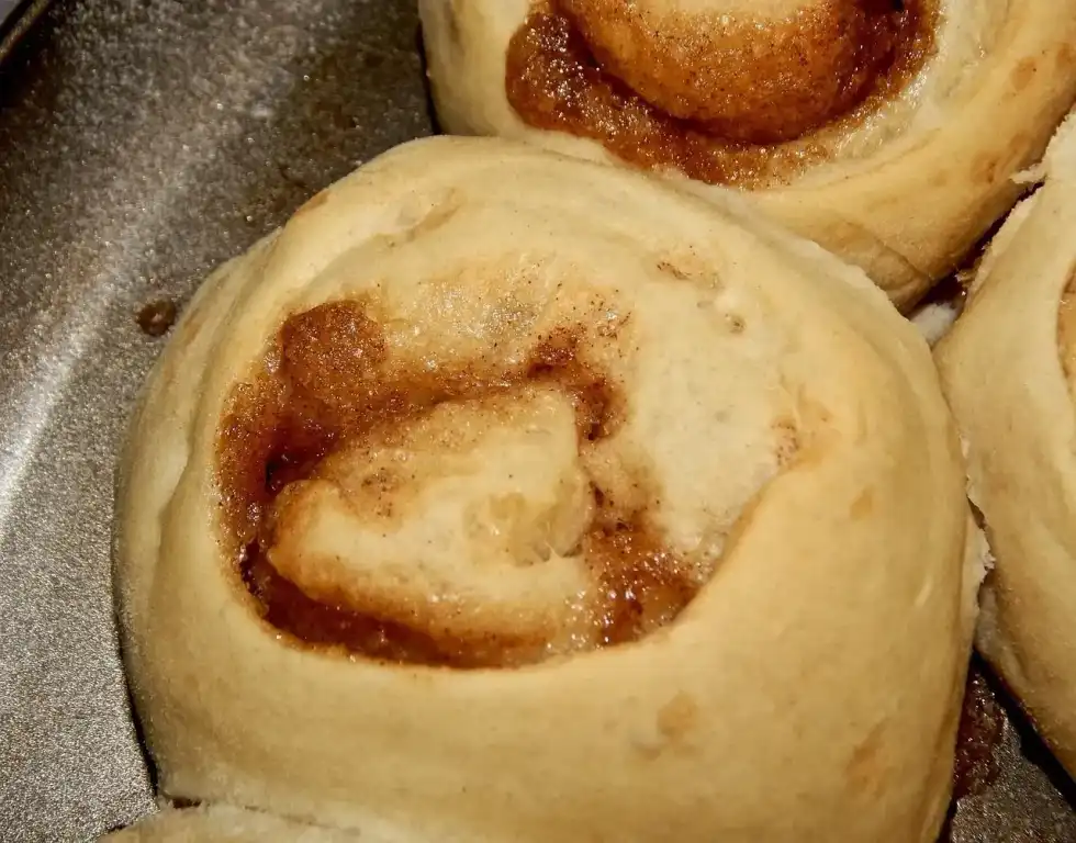 National Sticky Bun Day is a great day to enjoy this baked dessert for breakfast with some maple syrup, honey, and nuts.