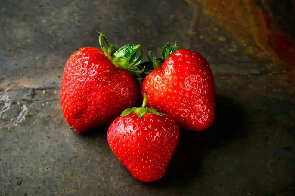 National Strawberry Day fun facts tell us that the fruit requires sandy soil and full sun for ideal growth.