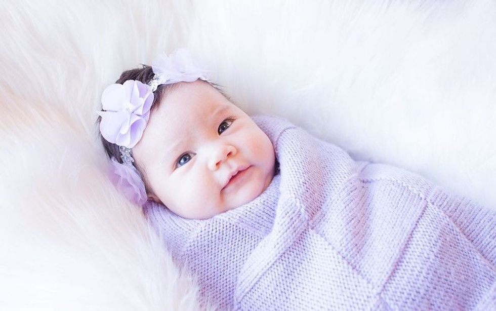 Newborn cute Girlie Girl in purple dress