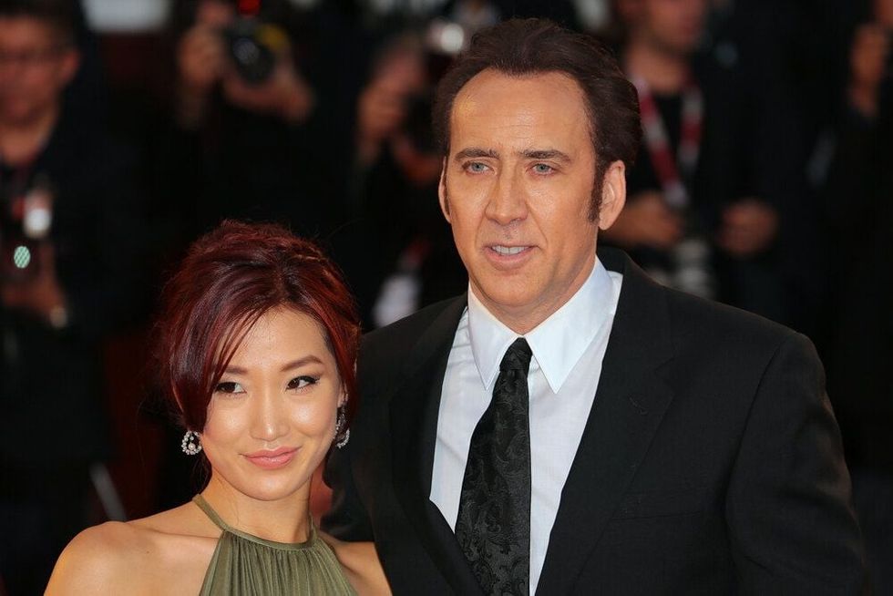 Nicolas cage with his wife at an event