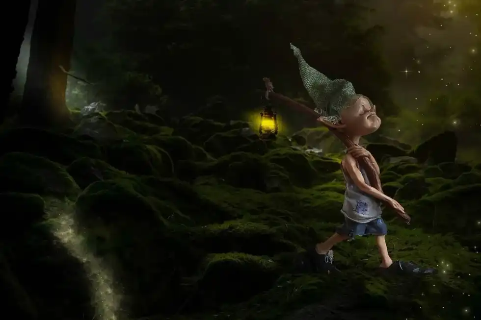 Night elf walking with a lamp in the forest