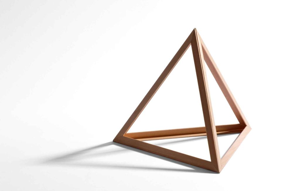 Open empty wooden triangular frame