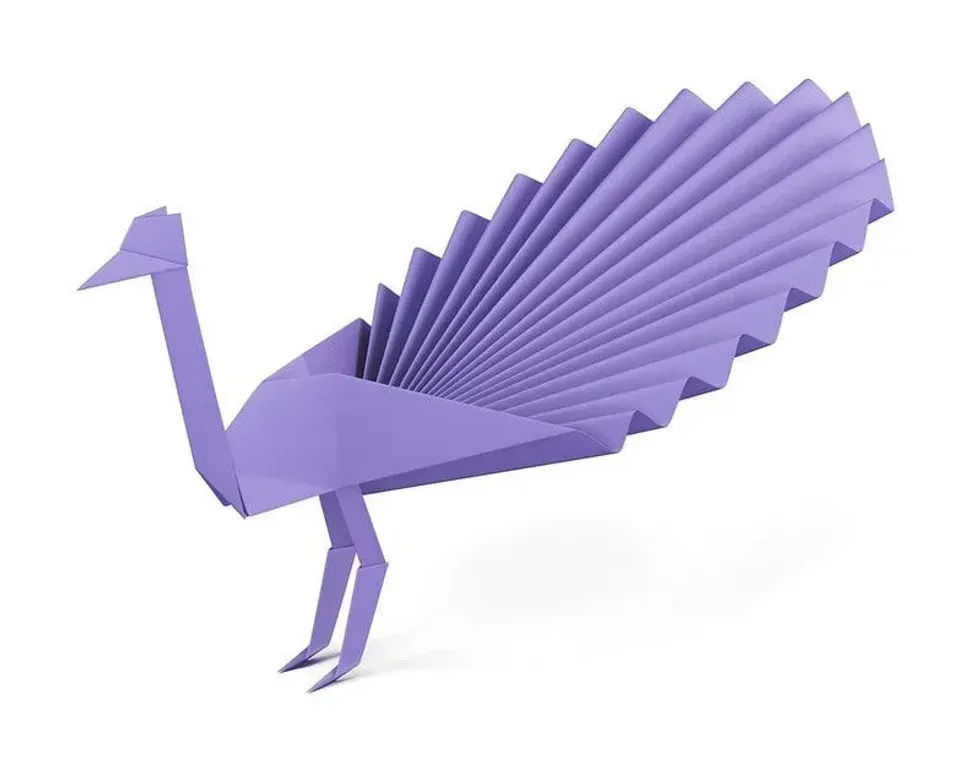 Origami peacock made out of lilac paper.