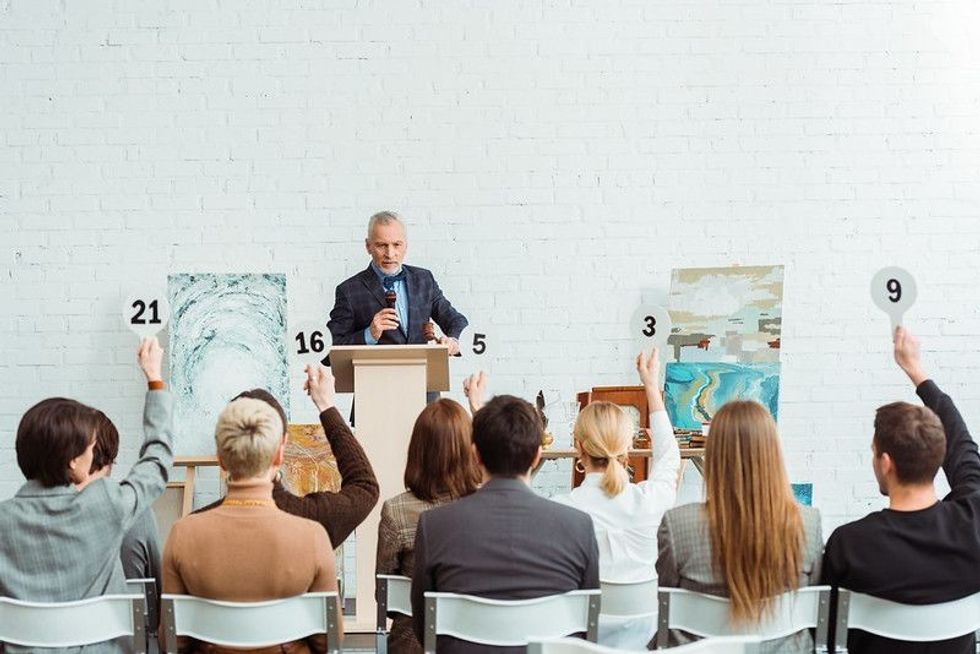 People are attentive in a auction