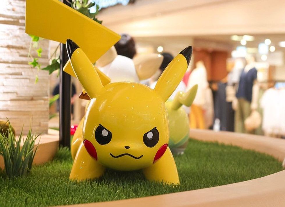 Pikachu toy on a grass