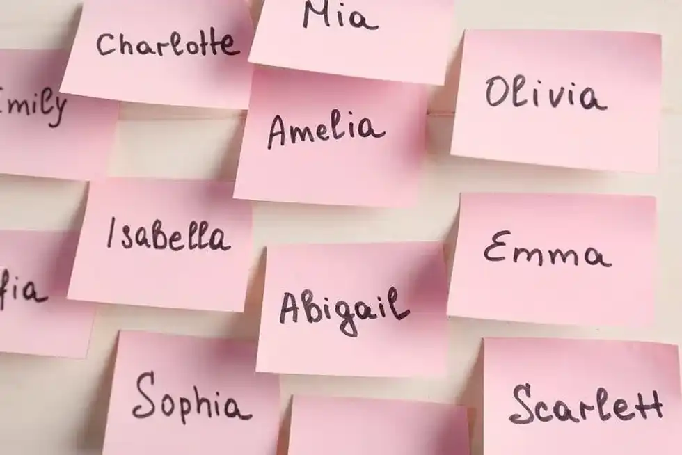 Pink post-it notes suggesting chic old lady names.