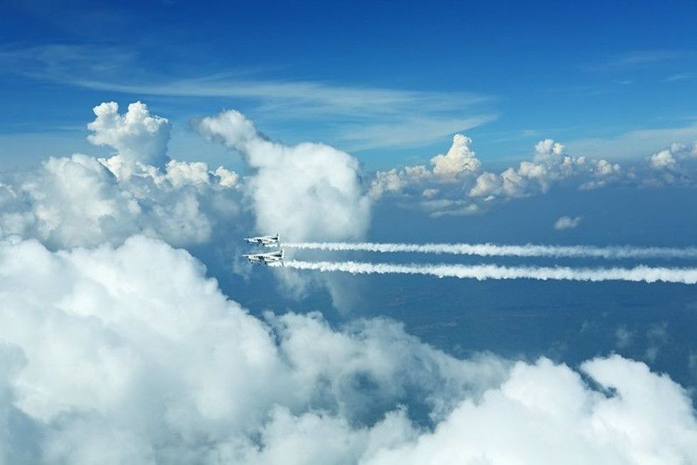 Planes creating artificial rain using chemicals