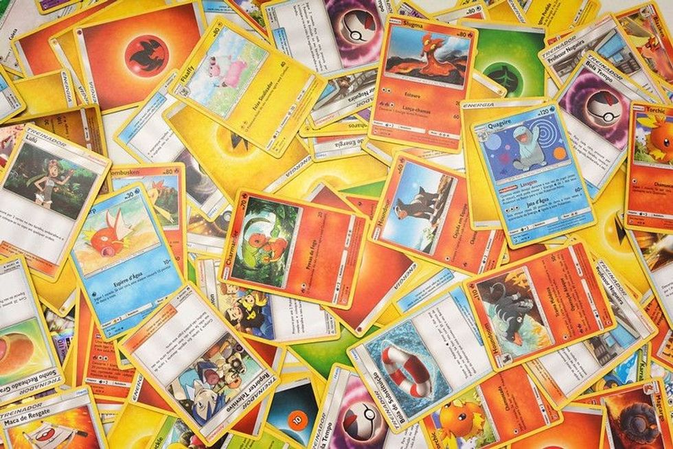 pokemon cards on a table - Nicknames