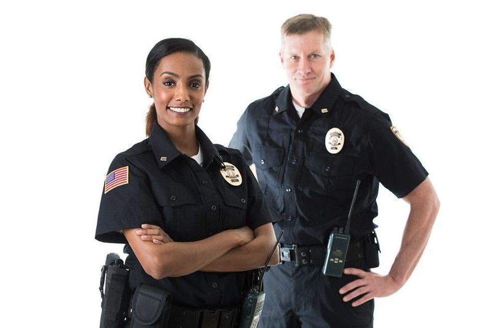 Police Officers in dress with white background.