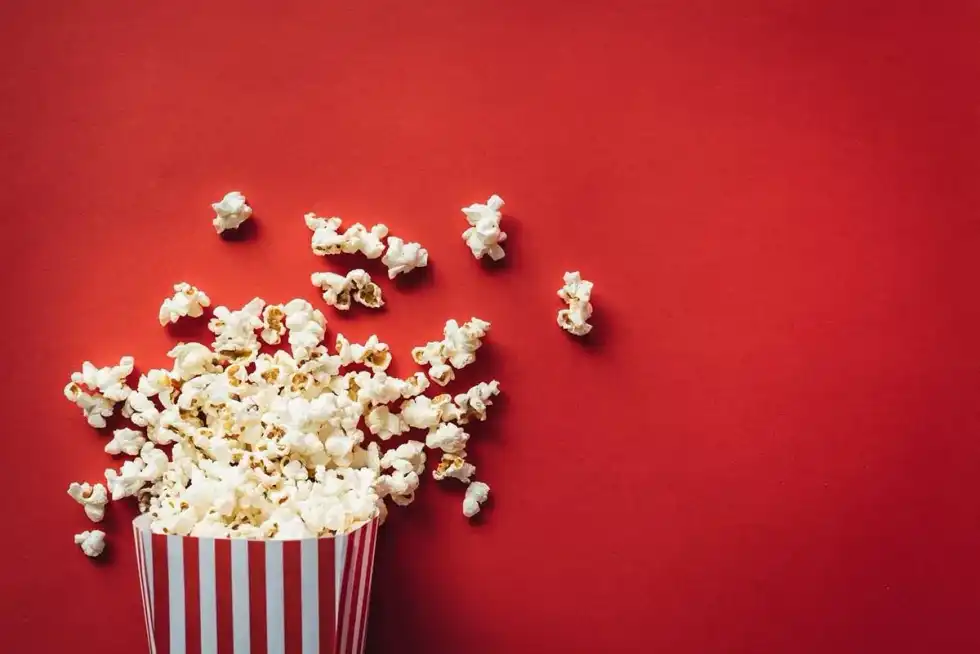 Popcorn ready to be eaten while watching a musical.