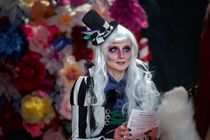 Portrait of charming female as Beetlejuice - fictional character appearing in Tim Burton's movie.