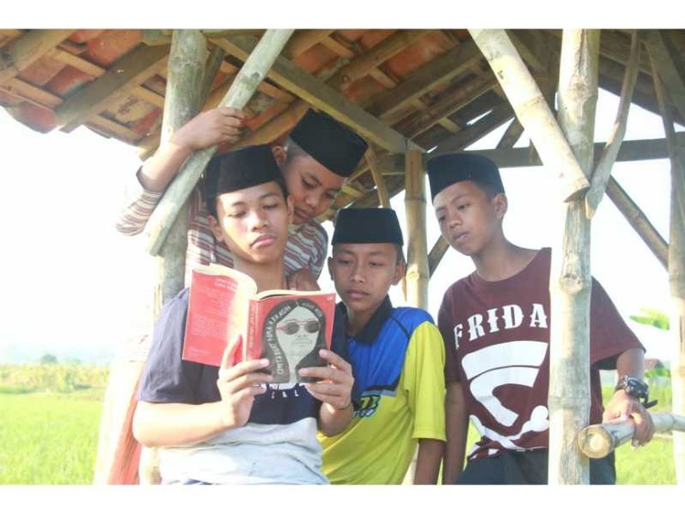 Portrait of Village Children Gathering Reading Books
