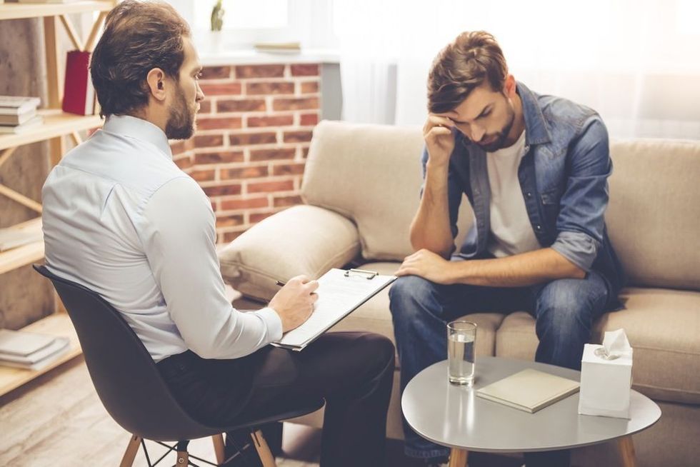 Psychologist talking to the young man