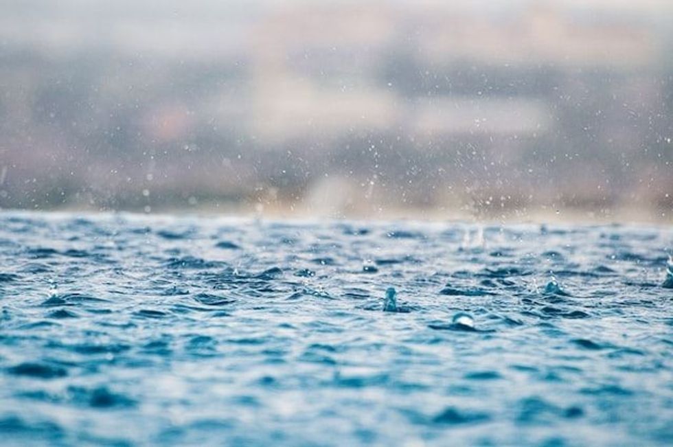 Rain drops on water. 
