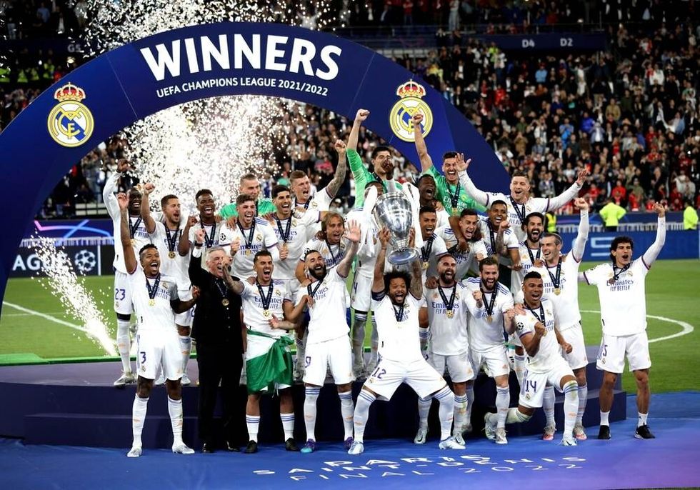 Real Madrid players celebrate lifting the trophy after winning the UEFA Champions League final LIVERPOOL FC v REAL MADRID CF at the Stade de France.