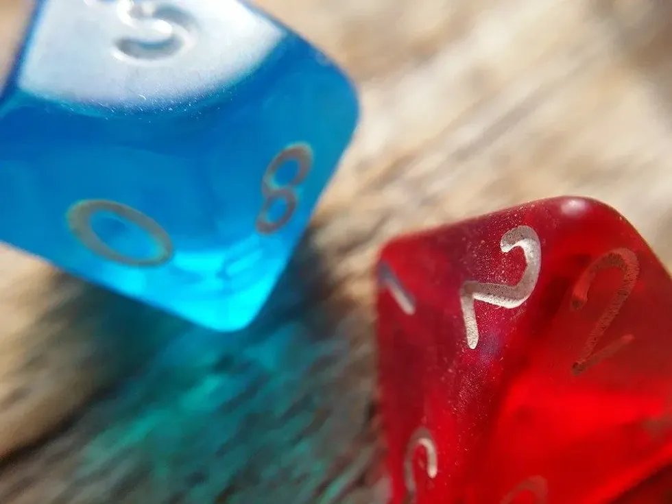 Red and blue d20 dice from the game Dungeons and dragons