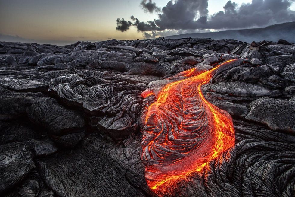 Red Orange vibrant Molten Lava Magma flowing