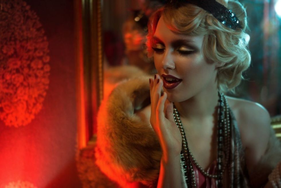Retro portrait of a beautiful Gatsby woman.