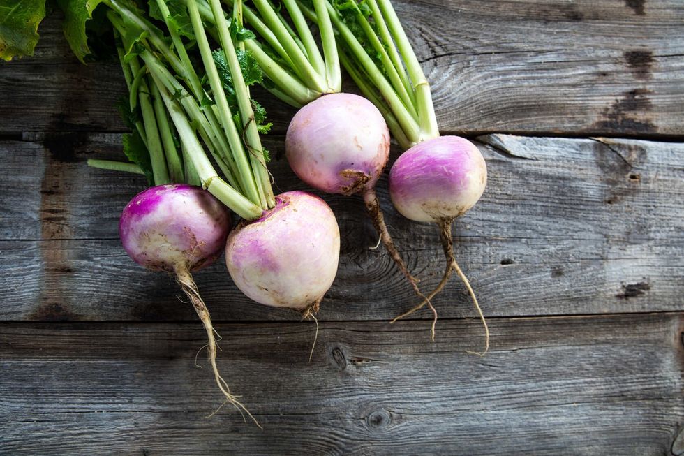 Rustic organic turnips with fresh green tops