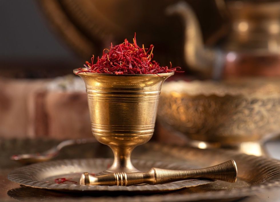Saffron in traditional bronze cup front view