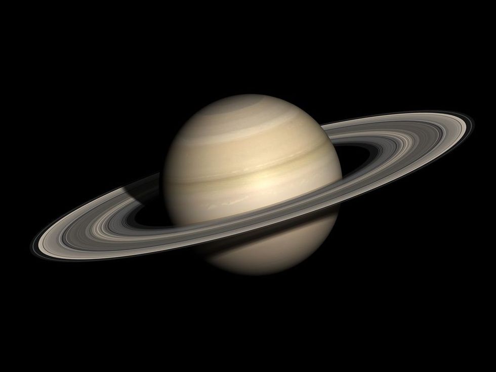 Saturn, isolated on black.