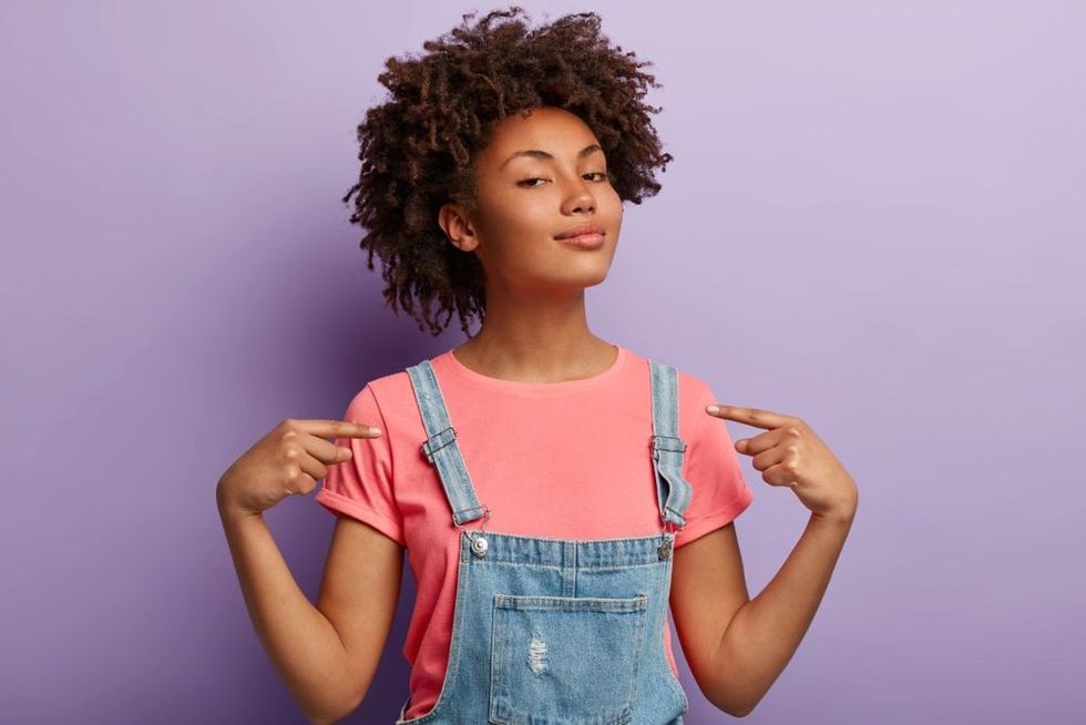 Self assured proud woman with Afro hairstyle